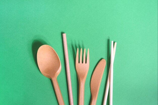 Zero waste kitchenware on the green background