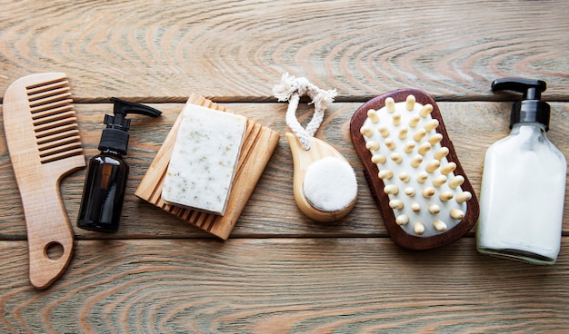 Zero waste natural cosmetics products on wooden table. Flat lay.