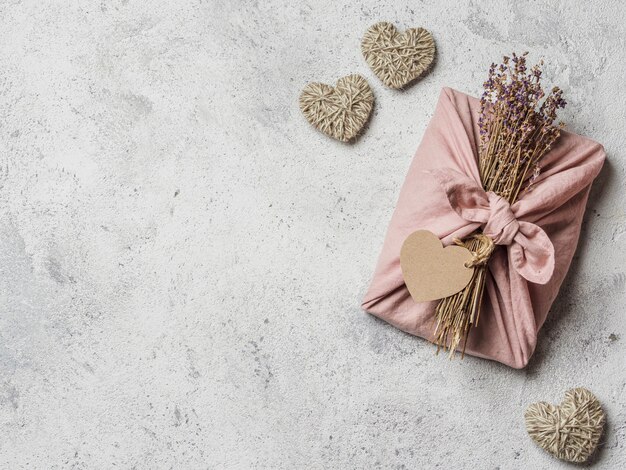 Zero waste, Valentine's Day eco-friendly gift wrapping in Furoshiki style with dry lavender.