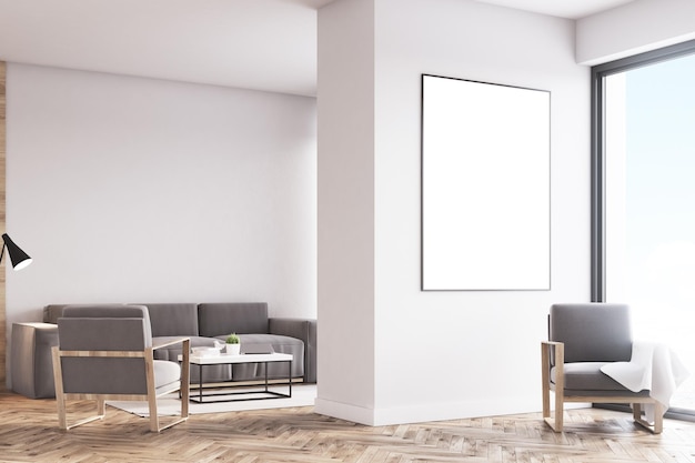 Zijaanzicht van het interieur van een woonkamer met witte muren, twee grijze fauteuils, een bank en een grote ingelijste verticale poster. 3D-rendering, mock-up