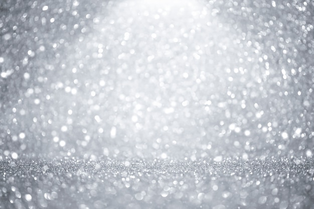 zilveren kerstachtergrond met bokeh en glitter