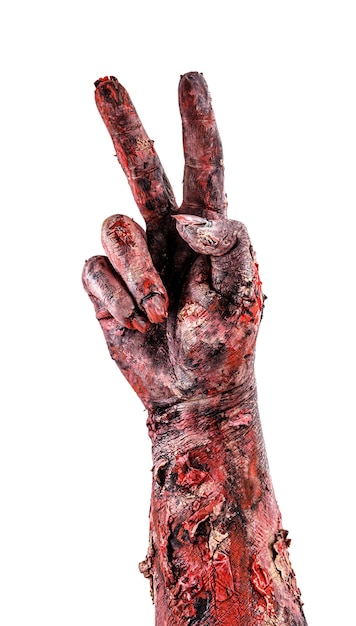 Zombie hand with two fingers, countdown or victory sign, isolated white surface.