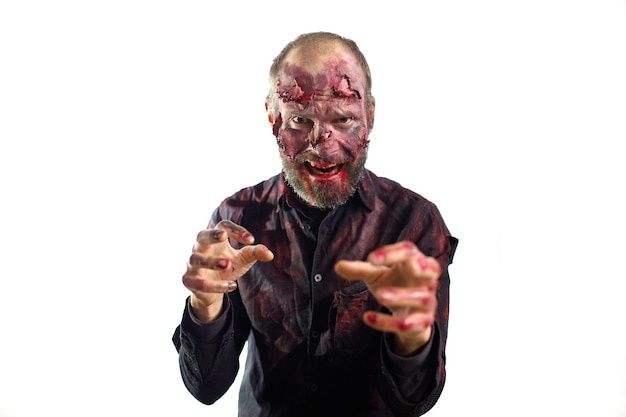 Zombie mannelijke make-up voor halloween concept. Bloed op huid gezicht