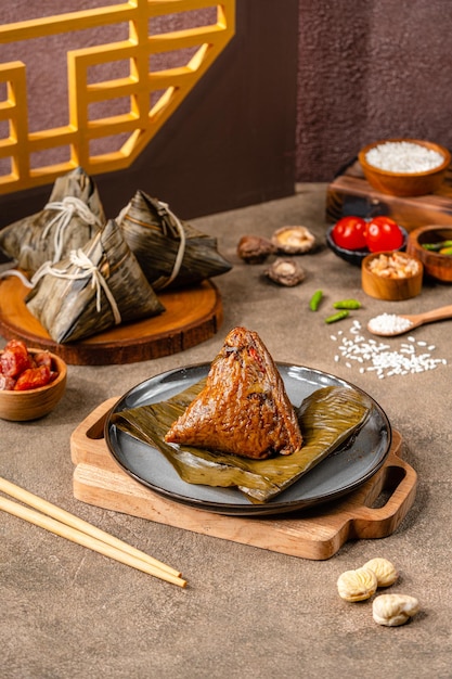 Zongzi or Bakcang is a traditional Chinese rice dish made of glutinous rice