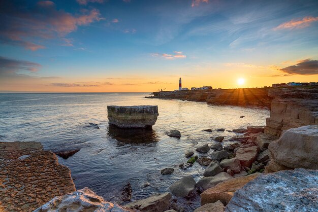 Zonsondergang bij de Vuurtoren van Portland Bill