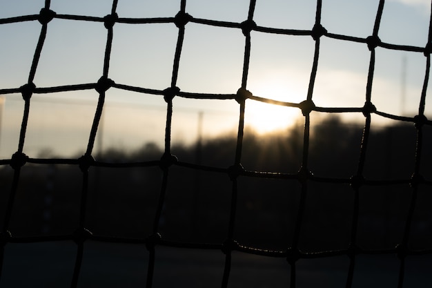 Zonsondergang op de tennisbaan