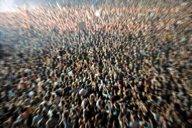 Zoom in effect on a blurred crowd