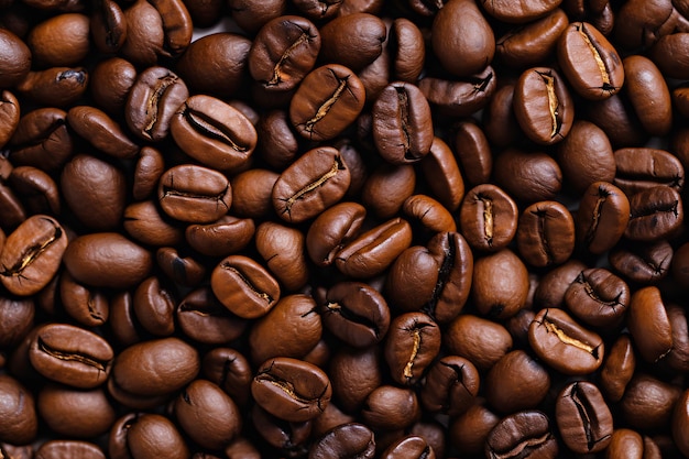 Zoomed roasted beans texture as background