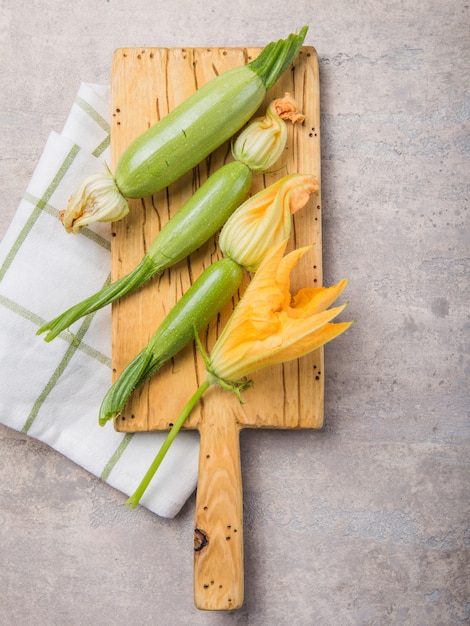 Zucchini  on concrete .