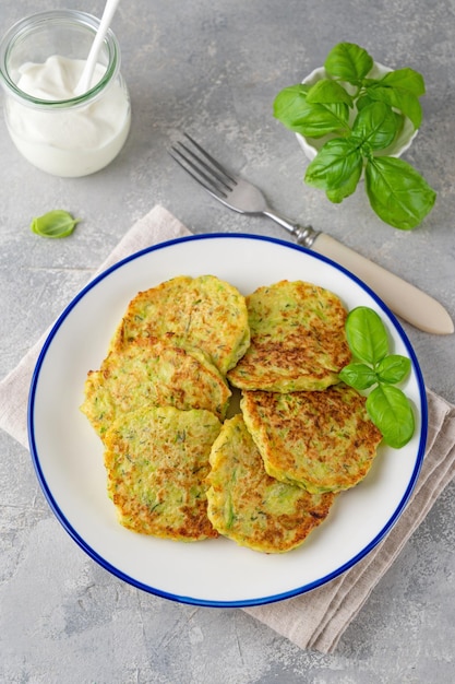 Zucchini fritters with cheese garlic and herbs Vegetarian zucchini pancakes