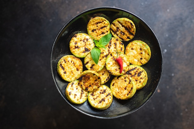 Zucchini grilled vegetable on the table healthy meal snack copy space food background rustic