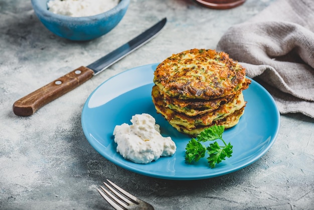 Zucchini parmesan pancakes with dip