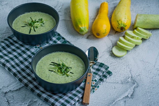 Zucchini puree soup and basil