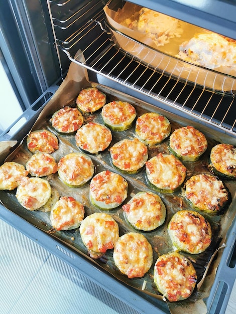 Zucchini slices and chicken baked in the oven