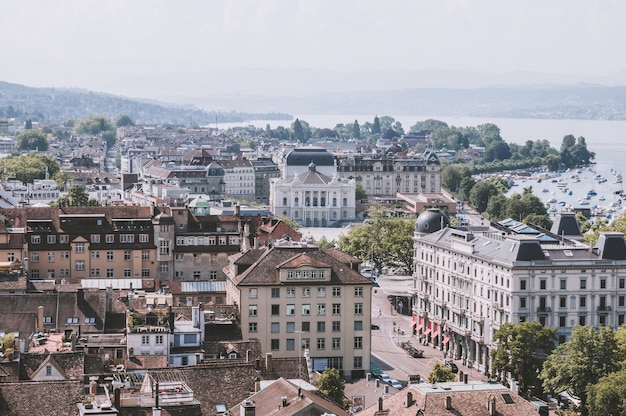 Zurich, Switzerland - June 19, 2017: Aerial view of historic Zurich city center with Opera house and lake Zurich from Grossmunster Church, Switzerland. Sunny day in summer