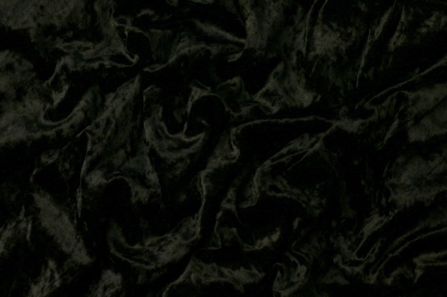 Zwart of donker getinte abstracte textiel textuur achtergrond