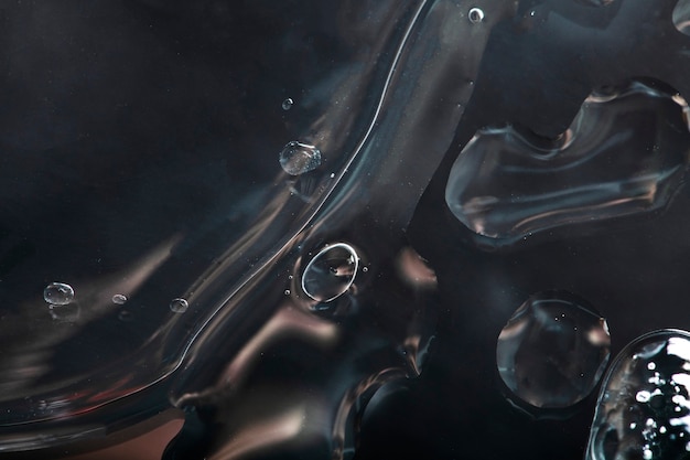 Zwart water achtergrond met bubbels