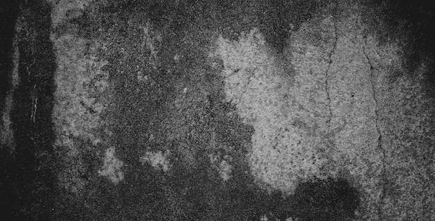 Zwarte donkere grungeachtergrond en textuur van zwarte betonnen muur