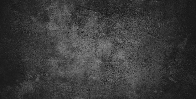 Zwarte donkere grungeachtergrond en textuur van zwarte betonnen muur