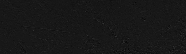 Zwarte muur zwarte steen zwart beton voor panoramische achtergrond Donkere cementachtergrond leeg voor ontwerp