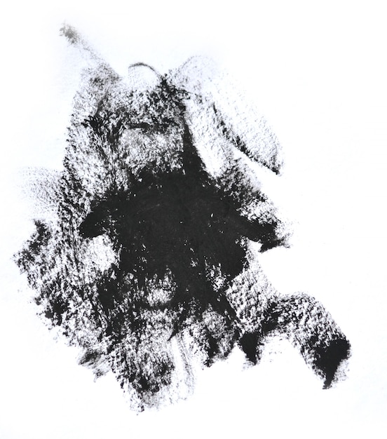 Zwarte penseelstreken olieverf op wit papier. Geïsoleerd op een witte achtergrond. Abstracte creatieve achtergrond