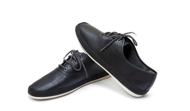 Zwarte schoenen geïsoleerd op de witte achtergrond