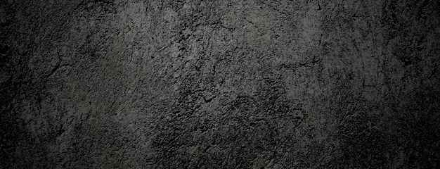Zwarte steen beton textuur achtergrond Donkergrijs zwart cement voor achtergrond
