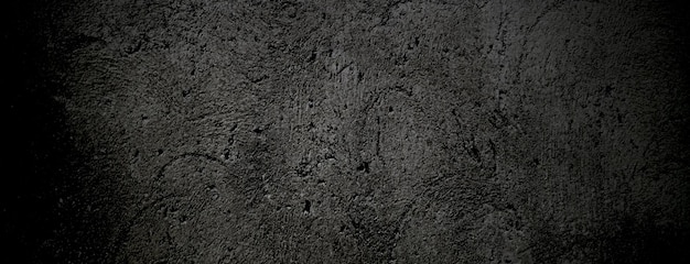 Zwarte steen beton textuur achtergrond Donkergrijs zwart cement voor achtergrond