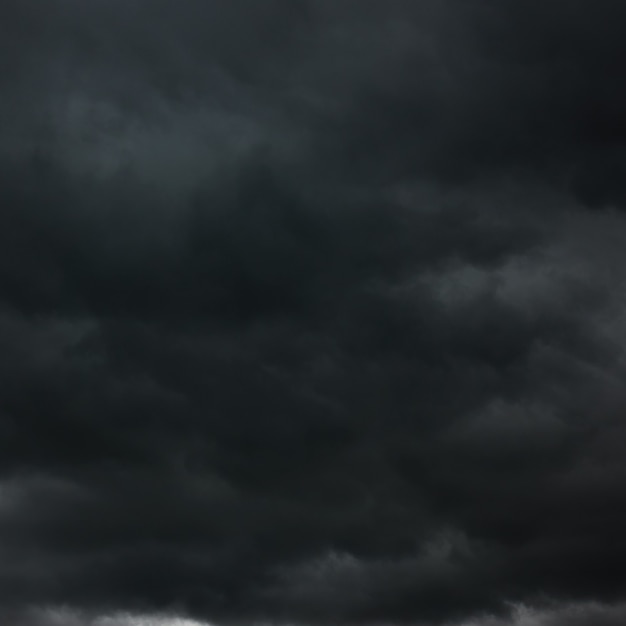 Foto zwarte zware wolken, kunnen als achtergrond worden gebruikt