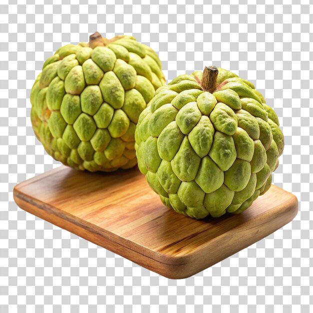 PSD 2 custard apples on cutting board on transparent background