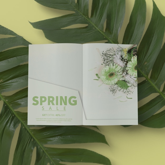 PSD 3d foliage with spring card on table mock-up