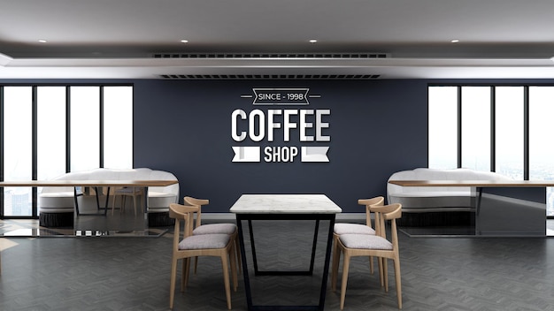 木製のテーブルと青い壁とコーヒーショップの3dロゴのモックアップ