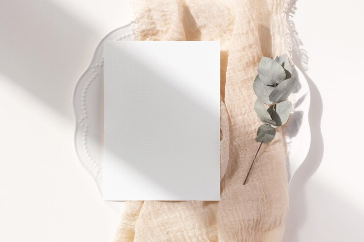 PSD 5x7 menu card mockup with eucalyptus leave on white plate
