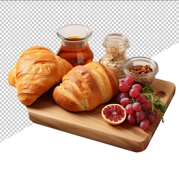 PSD a tray of croissants a fruit and a glass of honey