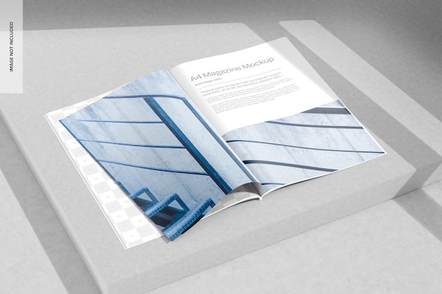 A4 Magazine on Concrete Background Mockup Perspective