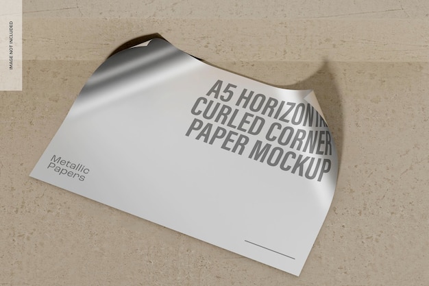 PSD a5 horizontal metallic curled corner paper mockup, high angle view