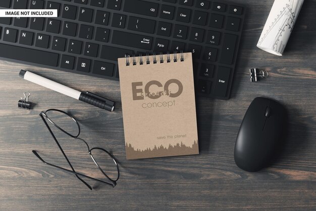 A6 spiral notebook in the workplace mockup