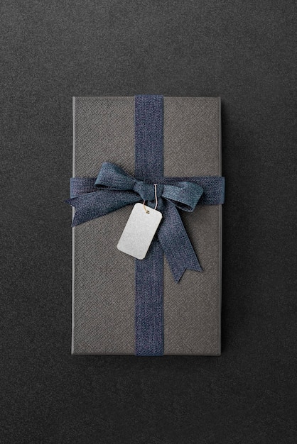 PSD aerial view of gift box with a tag mockup