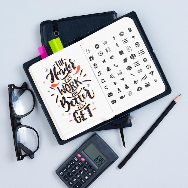 Agenda on desk with motivational quote