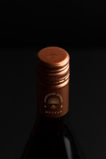 PSD alcoholic beverage bottle with label and logo effect