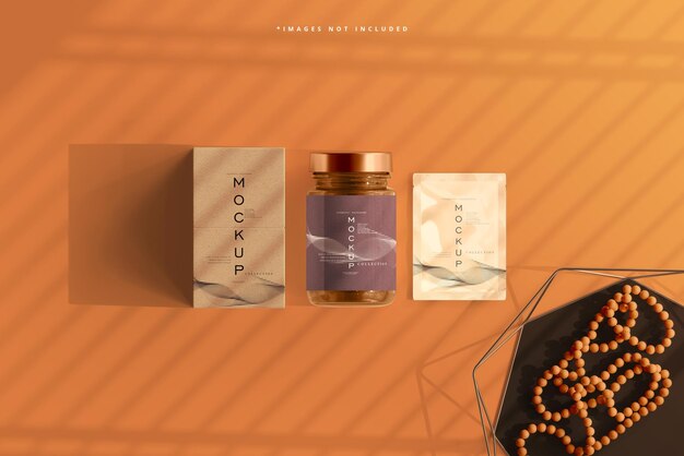 Amber glass cosmetic jar with sachet and box mockup