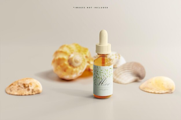 Amber glass dropper bottle mockup with seashells