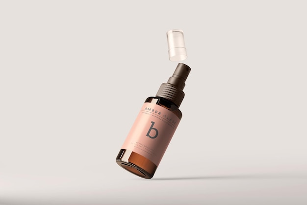 PSD mockup di bottiglie spray in vetro ambrato