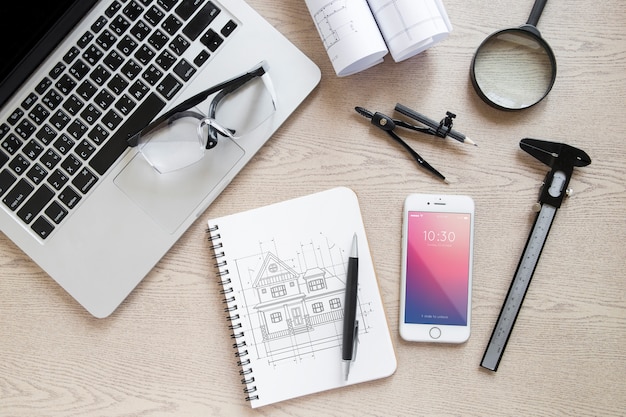 architecture composition with notepad and smartphone mockup