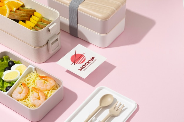 arrangement of bento box with mock-up card