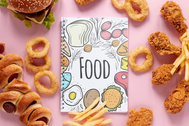 arrangement of fast food on plain background