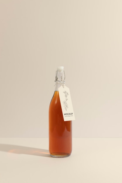 PSD arrangement of glass bottle with tag