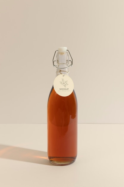 arrangement of glass bottle with tag