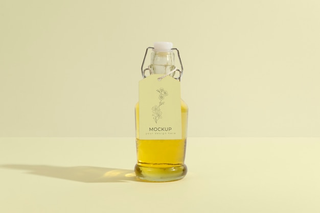 arrangement of glass bottle with tag