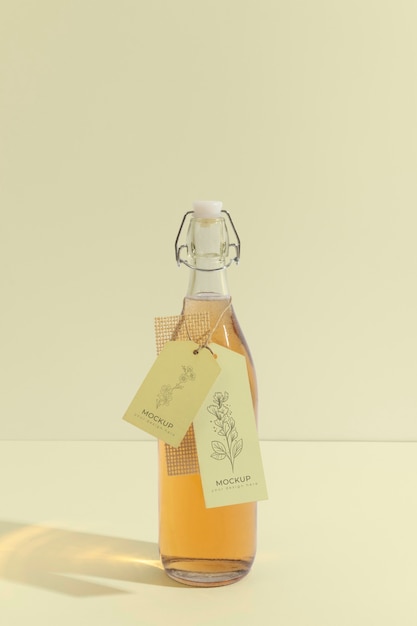 arrangement of glass bottle with tag